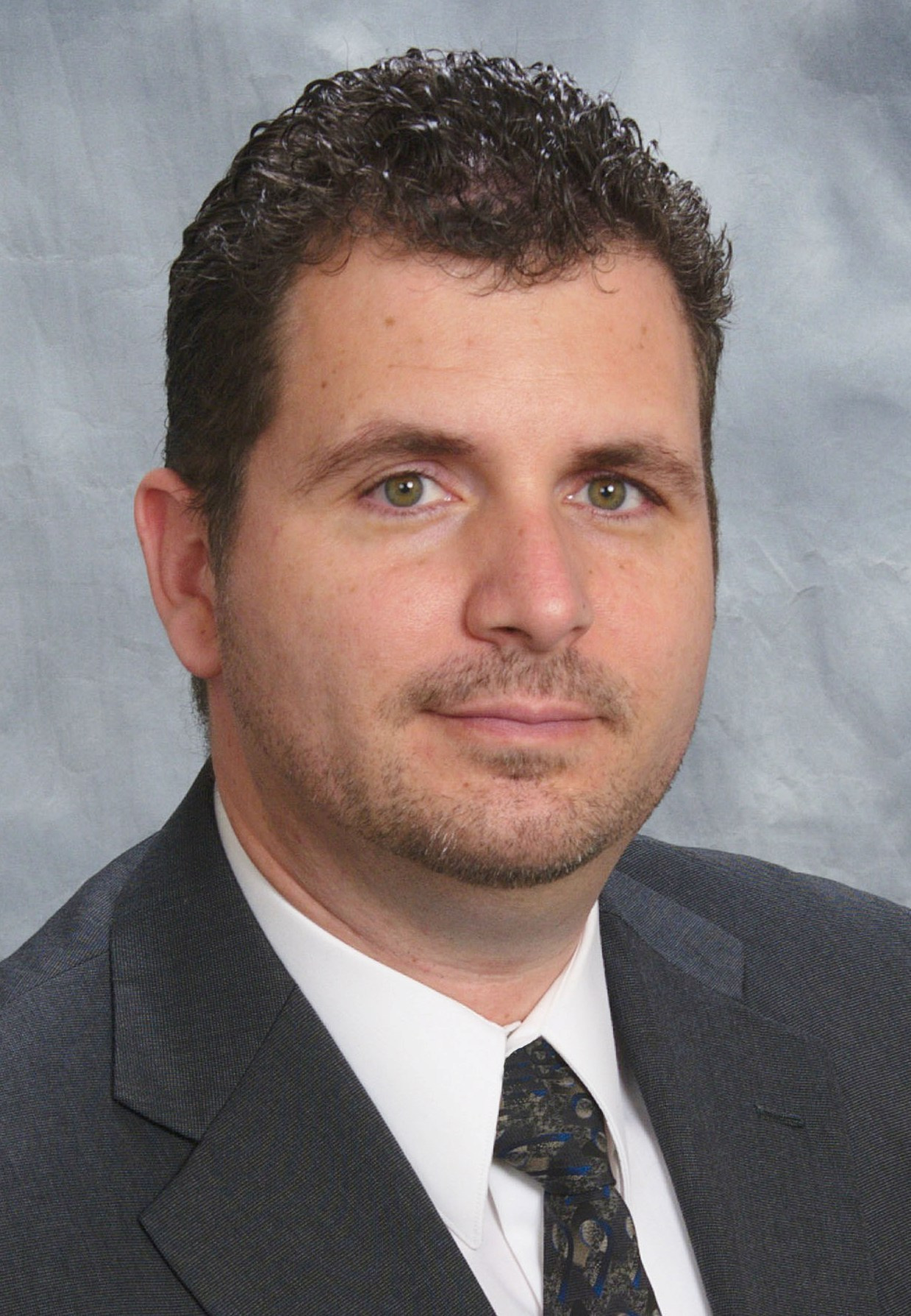 Christopher Schoell, OT, OTD, CHT